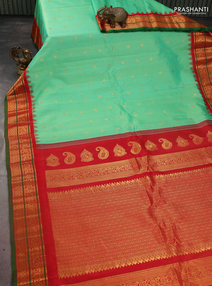 Pure gadwal silk saree teal green and red with allover zari checks & buttas and temple design zari woven border