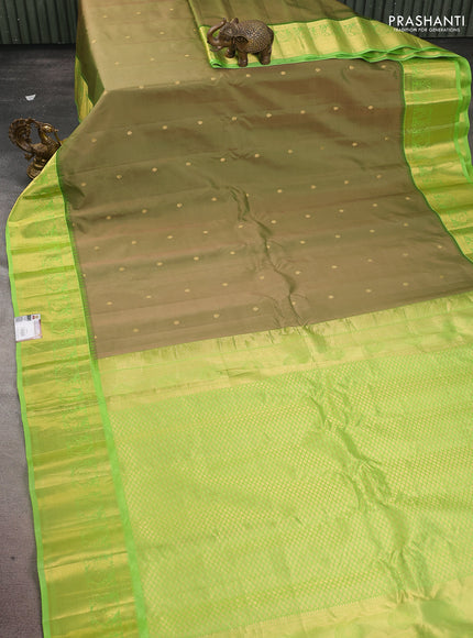 Pure gadwal silk saree dual shade of green and light green with zari woven buttas and temple design zari woven border