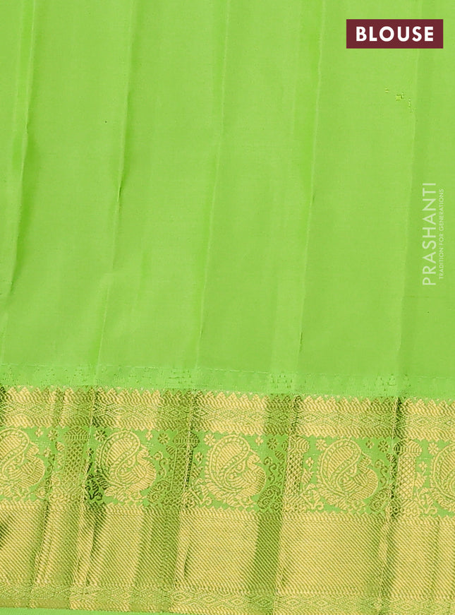 Pure gadwal silk saree dual shade of green and light green with zari woven buttas and temple design zari woven border