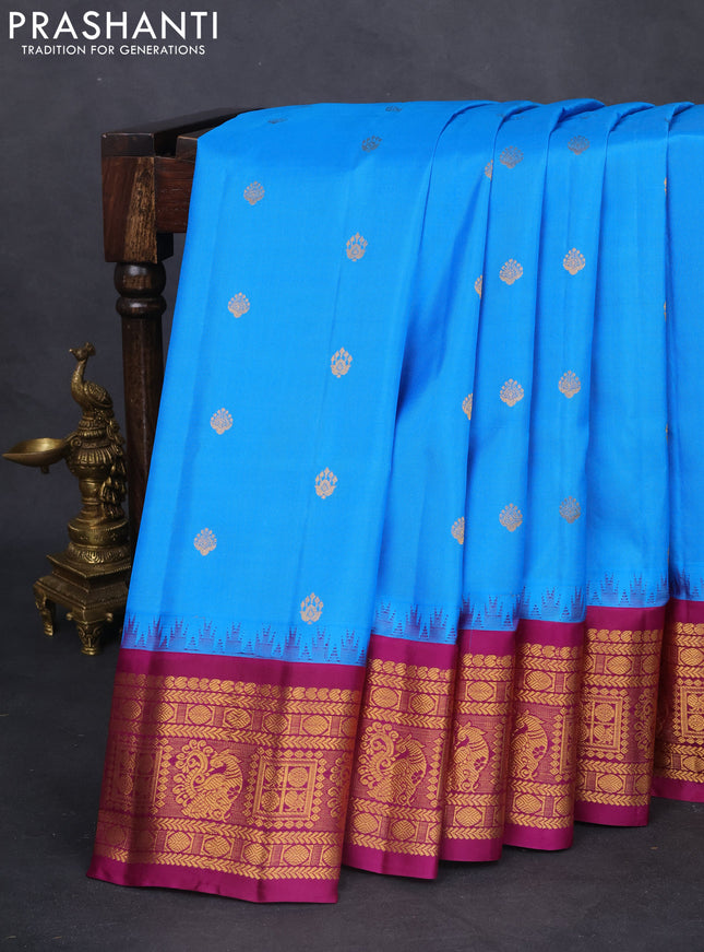 Pure gadwal silk saree cs blue and purple with zari woven buttas and temple design zari woven border