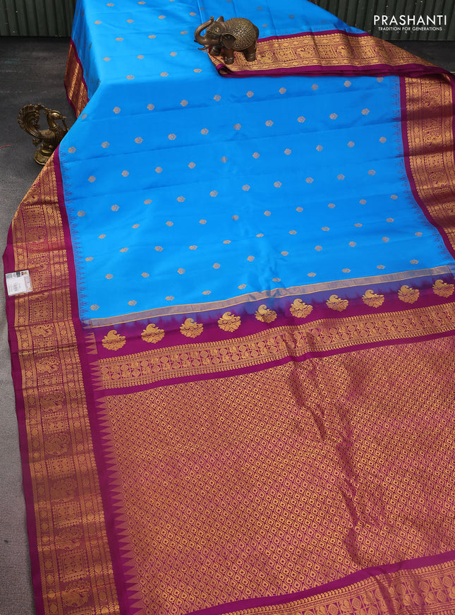 Pure gadwal silk saree cs blue and purple with zari woven buttas and temple design zari woven border