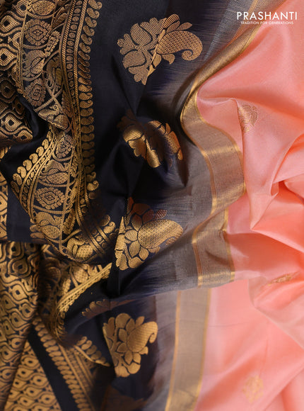 Pure gadwal silk saree peach shade and black with zari woven buttas and temple design zari woven border