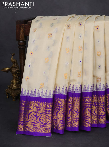 Pure gadwal silk saree cream and blue with silver & gold zari woven buttas and temple design zari woven border
