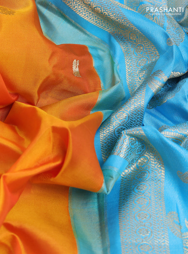 Pure gadwal silk saree mango yellow and light blue with annam zari woven buttas and temple design zari woven border