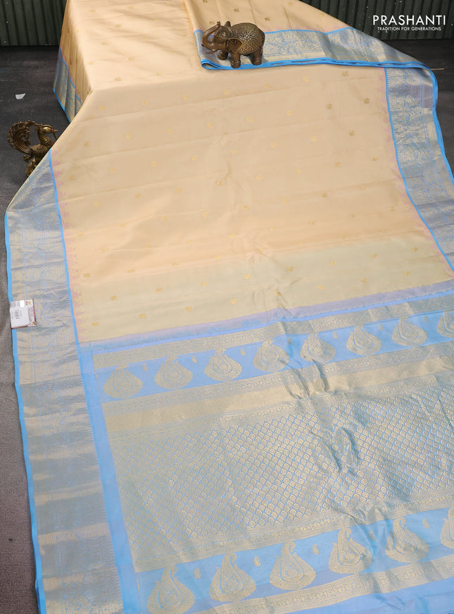 Pure gadwal silk saree cream and light blue with annam zari woven buttas and temple design zari woven border