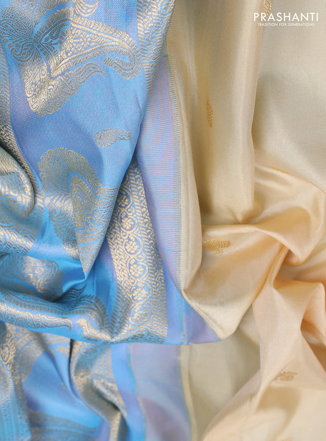 Pure gadwal silk saree cream and light blue with annam zari woven buttas and temple design zari woven border