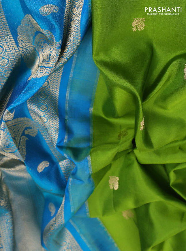 Pure gadwal silk saree light green and cs blue with annam zari woven buttas and temple design zari woven border