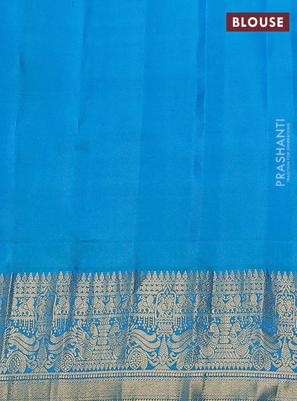 Pure gadwal silk saree light green and cs blue with annam zari woven buttas and temple design zari woven border