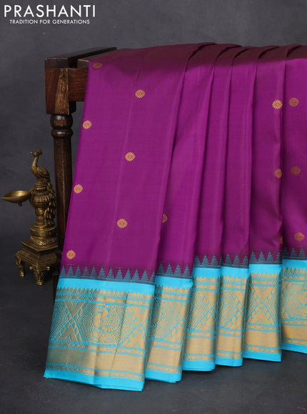 Pure gadwal silk saree purple and teal blue with zari woven buttas and temple design zari woven border