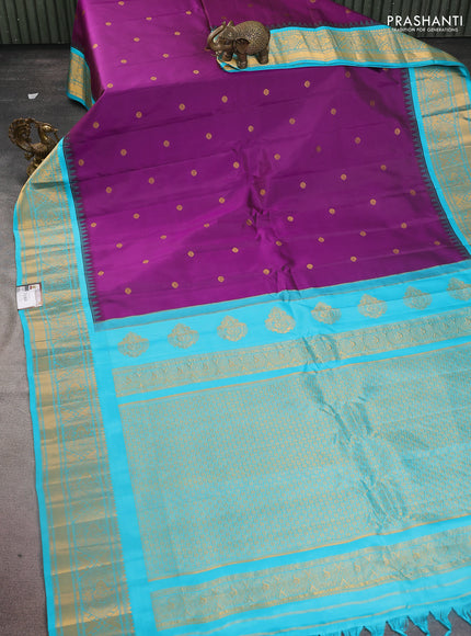 Pure gadwal silk saree purple and teal blue with zari woven buttas and temple design zari woven border