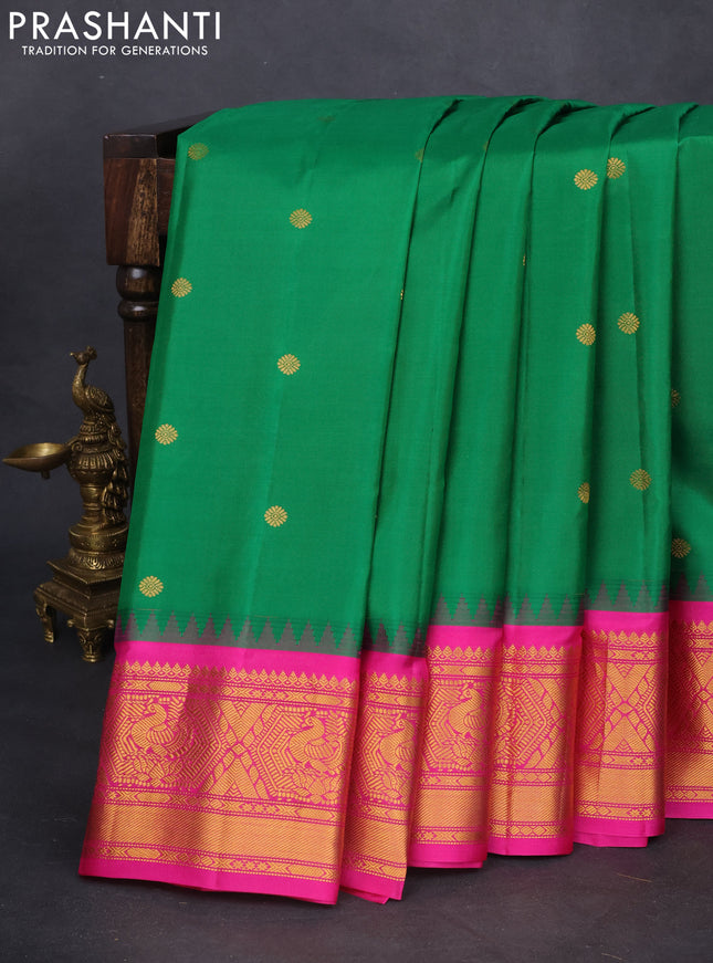 Pure gadwal silk saree green and pink with zari woven buttas and temple design zari woven border