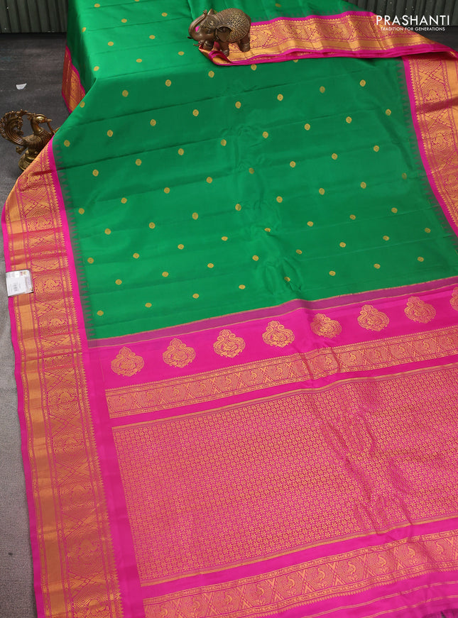 Pure gadwal silk saree green and pink with zari woven buttas and temple design zari woven border
