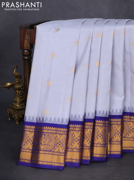 Pure gadwal silk saree grey and dark blue with zari woven buttas and temple design zari woven border