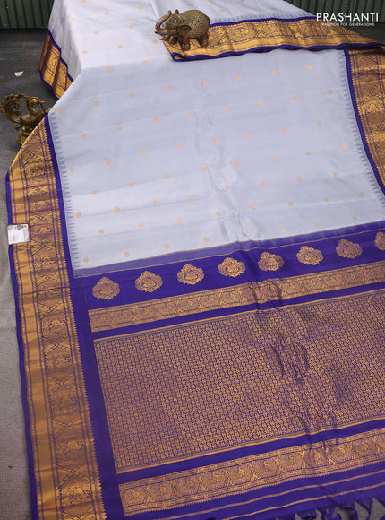 Pure gadwal silk saree grey and dark blue with zari woven buttas and temple design zari woven border
