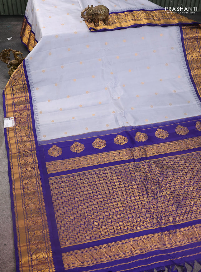 Pure gadwal silk saree grey and dark blue with zari woven buttas and temple design zari woven border