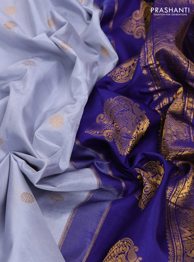 Pure gadwal silk saree grey and dark blue with zari woven buttas and temple design zari woven border