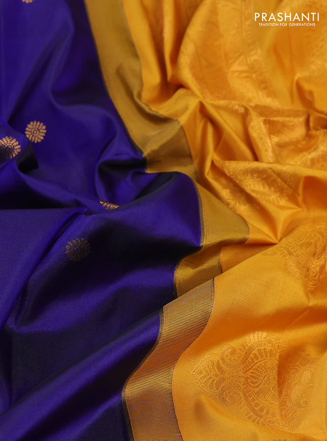 Pure gadwal silk saree dark blue and mustard yellow with zari woven buttas and temple design zari woven border