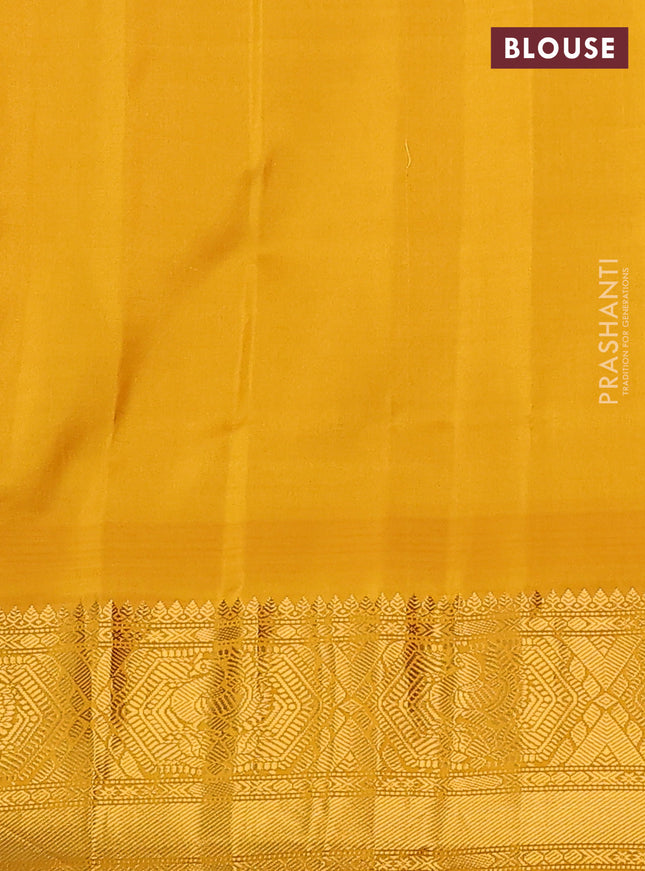 Pure gadwal silk saree dark blue and mustard yellow with zari woven buttas and temple design zari woven border