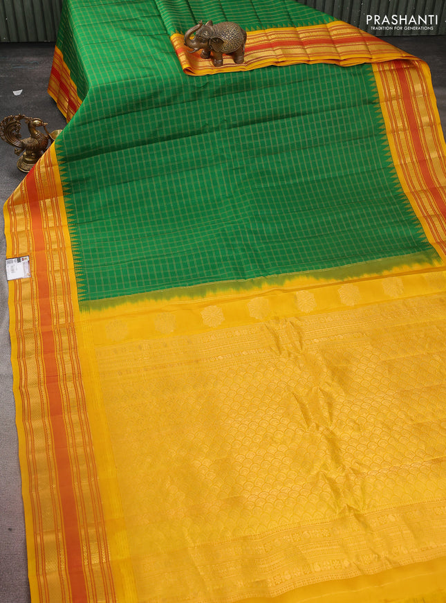Pure gadwal silk saree green and dark mustard with allover checked pattern and temple design zari woven border
