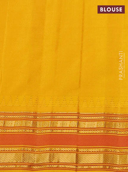 Pure gadwal silk saree green and dark mustard with allover checked pattern and temple design zari woven border