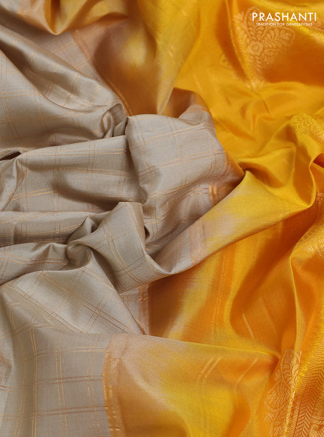 Pure gadwal silk saree beige and dark mustard with allover checked pattern and temple design zari woven border