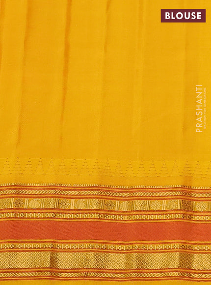 Pure gadwal silk saree beige and dark mustard with allover checked pattern and temple design zari woven border