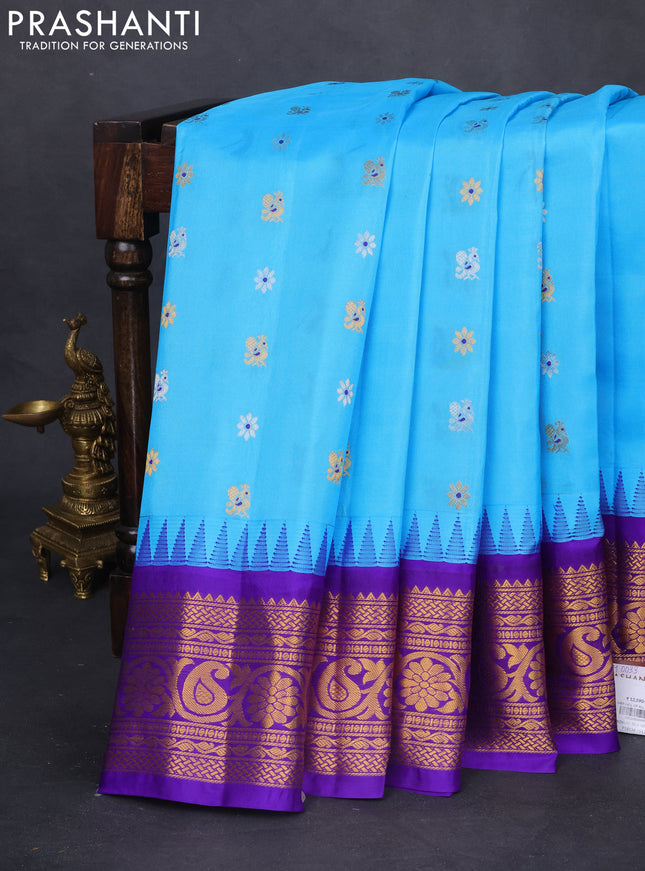 Pure gadwal silk saree light blue and blue with silver & gold zari woven buttas and temple design zari woven border
