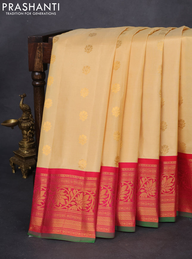 Pure gadwal silk saree sandal and purple with floral zari woven buttas and zari woven korvai border