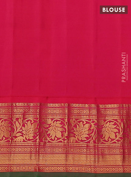 Pure gadwal silk saree sandal and purple with floral zari woven buttas and zari woven korvai border