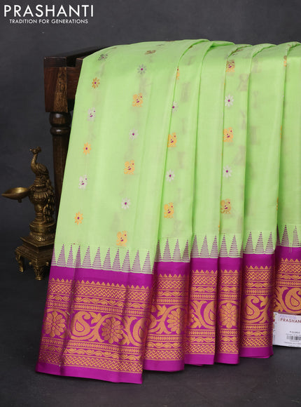 Pure gadwal silk saree pista green and purple with silver & gold zari woven buttas and temple design zari woven border