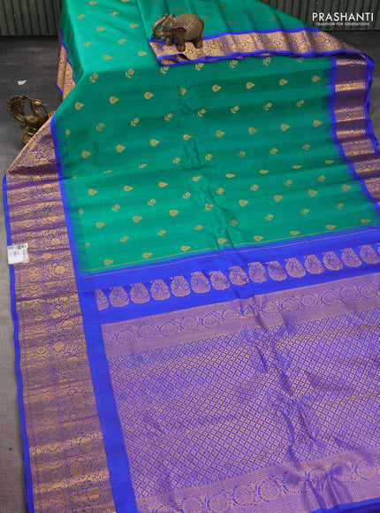 Pure gadwal silk saree green and blue with zari woven buttas and temple design zari woven border