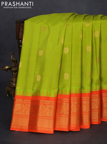 Pure gadwal silk saree light green and orange with allover checked pattern & zari buttas and temple design zari woven border