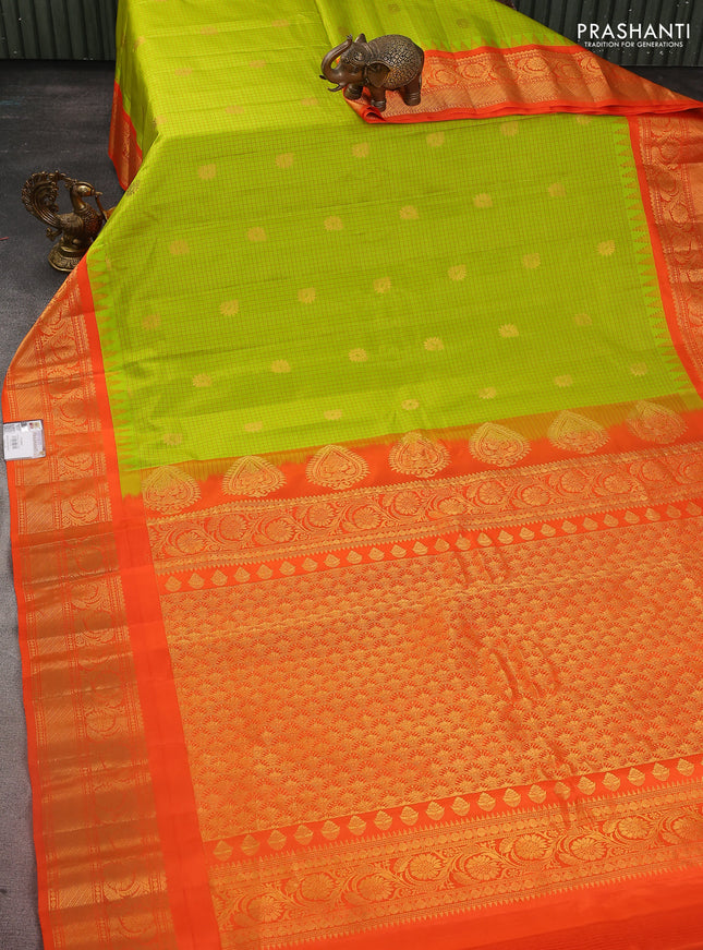 Pure gadwal silk saree light green and orange with allover checked pattern & zari buttas and temple design zari woven border