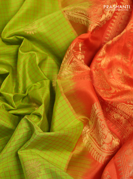 Pure gadwal silk saree light green and orange with allover checked pattern & zari buttas and temple design zari woven border