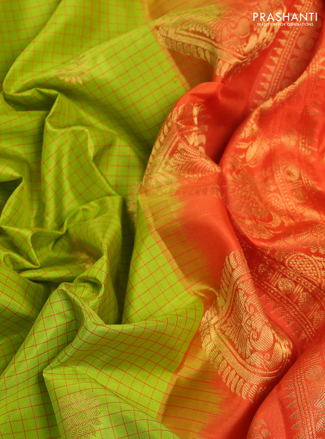 Pure gadwal silk saree light green and orange with allover checked pattern & zari buttas and temple design zari woven border