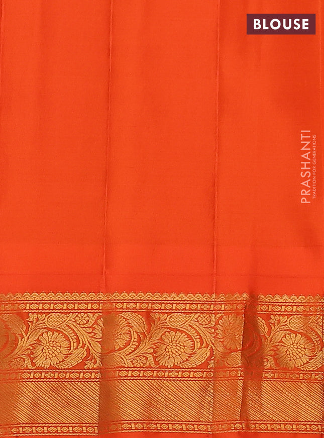 Pure gadwal silk saree light green and orange with allover checked pattern & zari buttas and temple design zari woven border