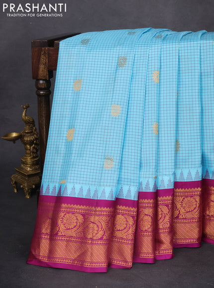 Pure gadwal silk saree light blue and purple with allover checked pattern & zari buttas and temple design zari woven border