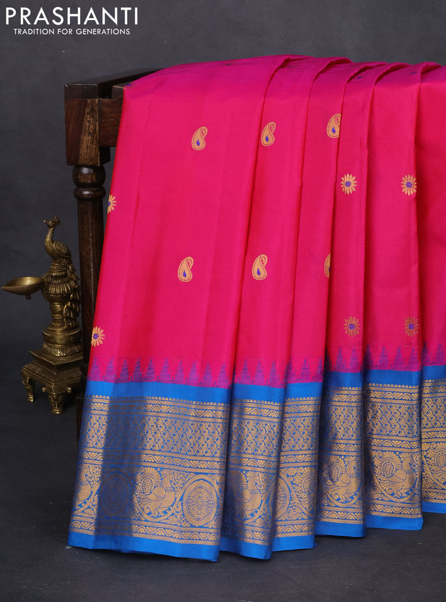Pure gadwal silk saree pink and cs blue with paisley zari woven buttas and temple design zari woven border