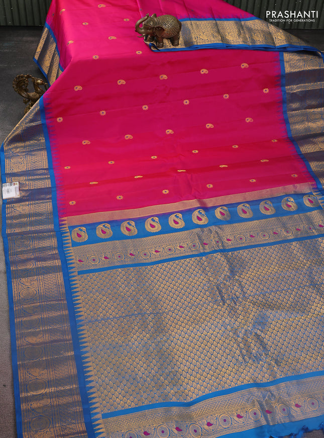 Pure gadwal silk saree pink and cs blue with paisley zari woven buttas and temple design zari woven border