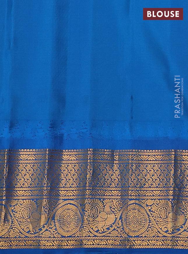 Pure gadwal silk saree pink and cs blue with paisley zari woven buttas and temple design zari woven border