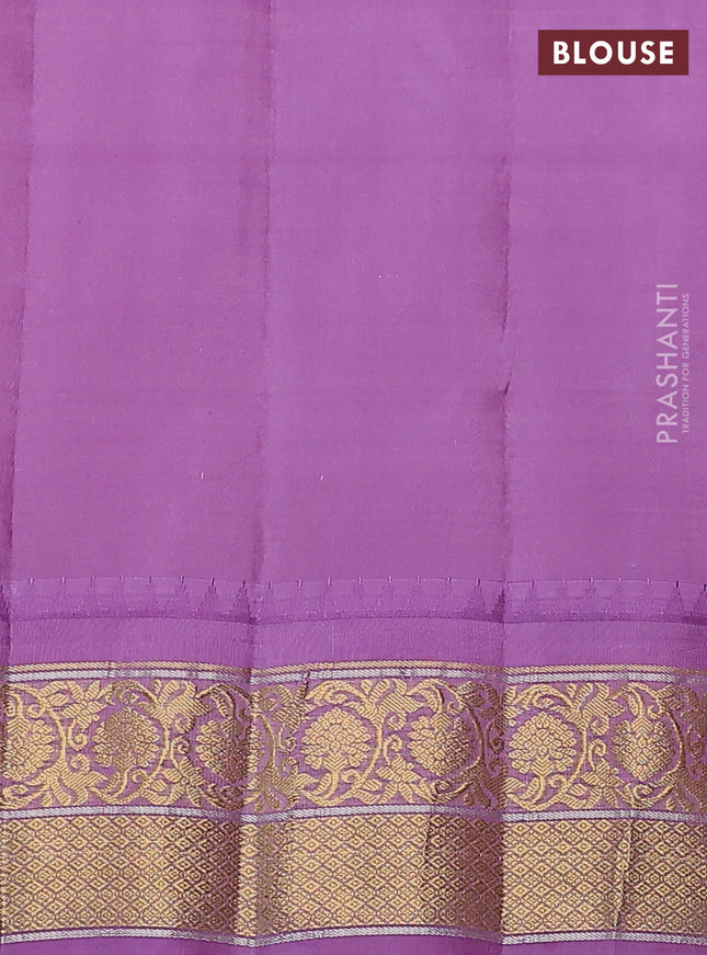 Pure gadwal silk saree peach shade and lavender with zari woven buttas and temple design zari woven border
