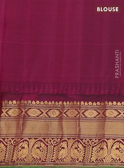Pure gadwal silk saree light green and dark magenta pink with zari woven buttas and temple design zari woven border