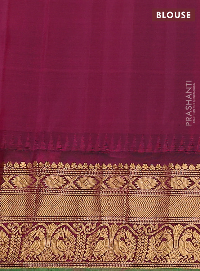 Pure gadwal silk saree light green and dark magenta pink with zari woven buttas and temple design zari woven border