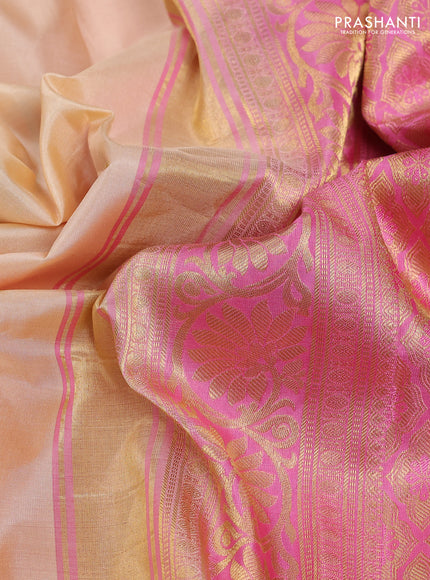 Pure gadwal silk saree sandal and light pink with zari woven buttas and temple design zari woven border