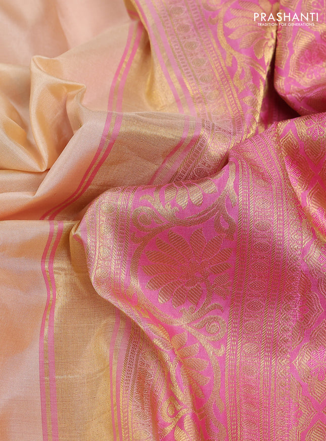 Pure gadwal silk saree sandal and light pink with zari woven buttas and temple design zari woven border