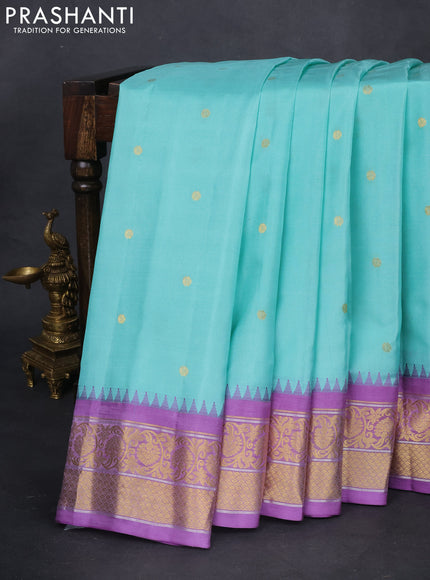 Pure gadwal silk saree teal blue and lavender with zari woven buttas and temple design zari woven border