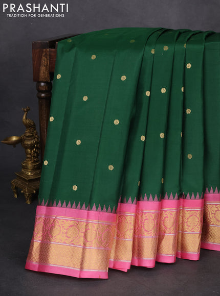 Pure gadwal silk saree green and light pink with zari woven buttas and temple design zari woven border