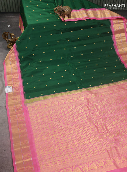 Pure gadwal silk saree green and light pink with zari woven buttas and temple design zari woven border