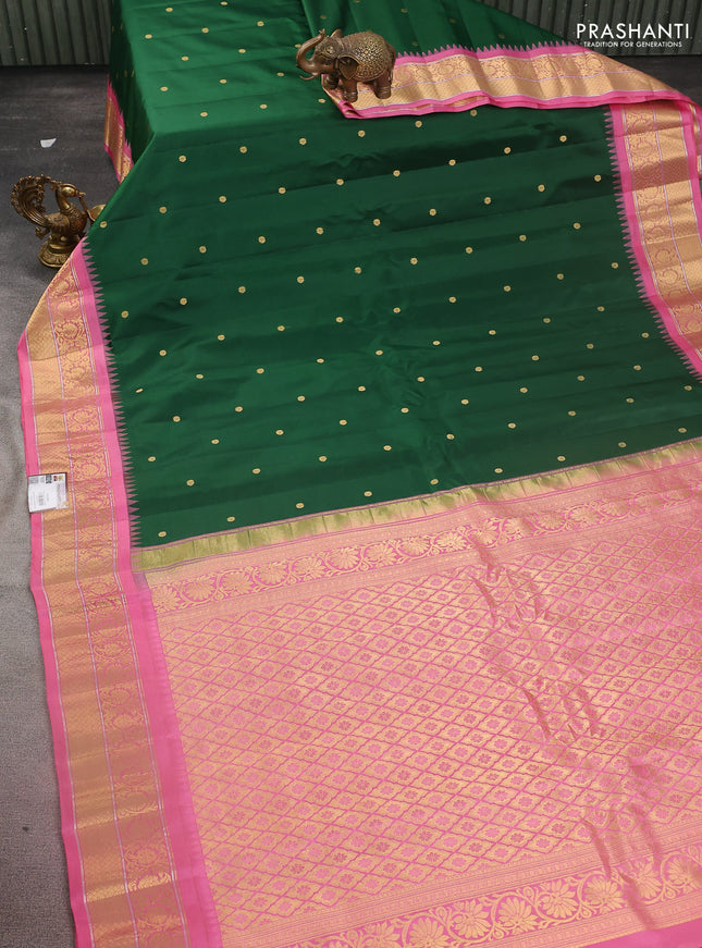 Pure gadwal silk saree green and light pink with zari woven buttas and temple design zari woven border