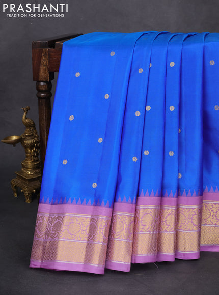 Pure gadwal silk saree blue and lavender with zari woven buttas and temple design zari woven border
